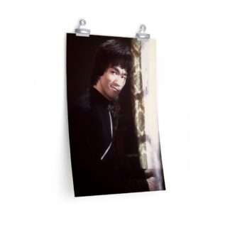 Poster print of Bruce Lee smirking by the window